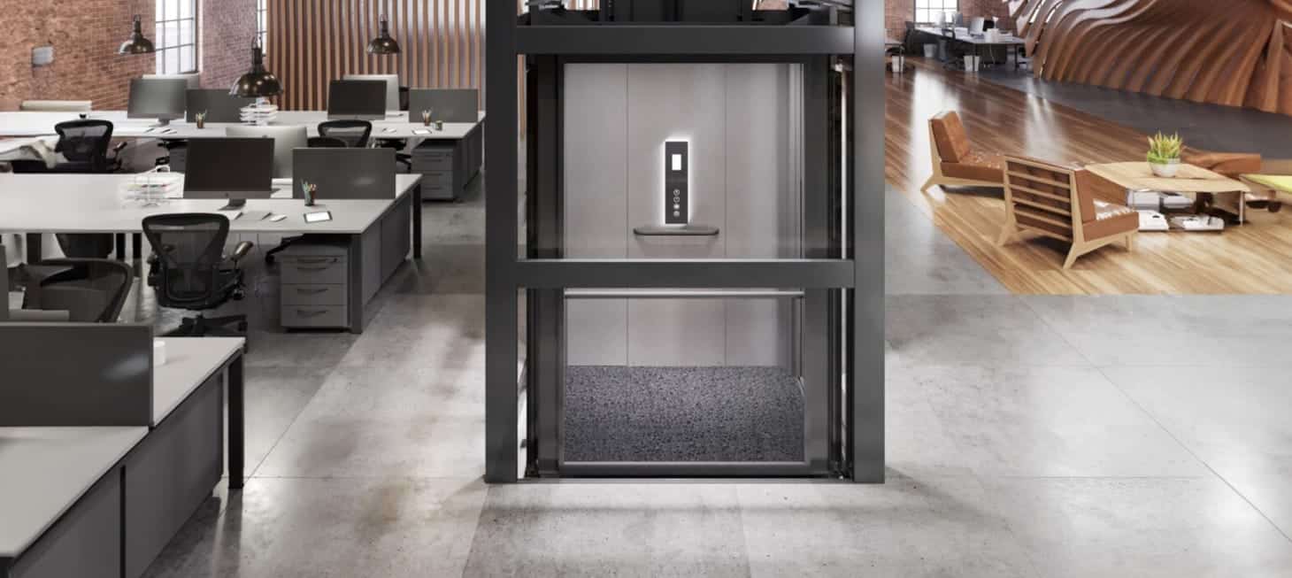 Modern office with an open elevator in the centre, surrounded by cubicles on the left and a cosy seating area with wooden decor on the right.